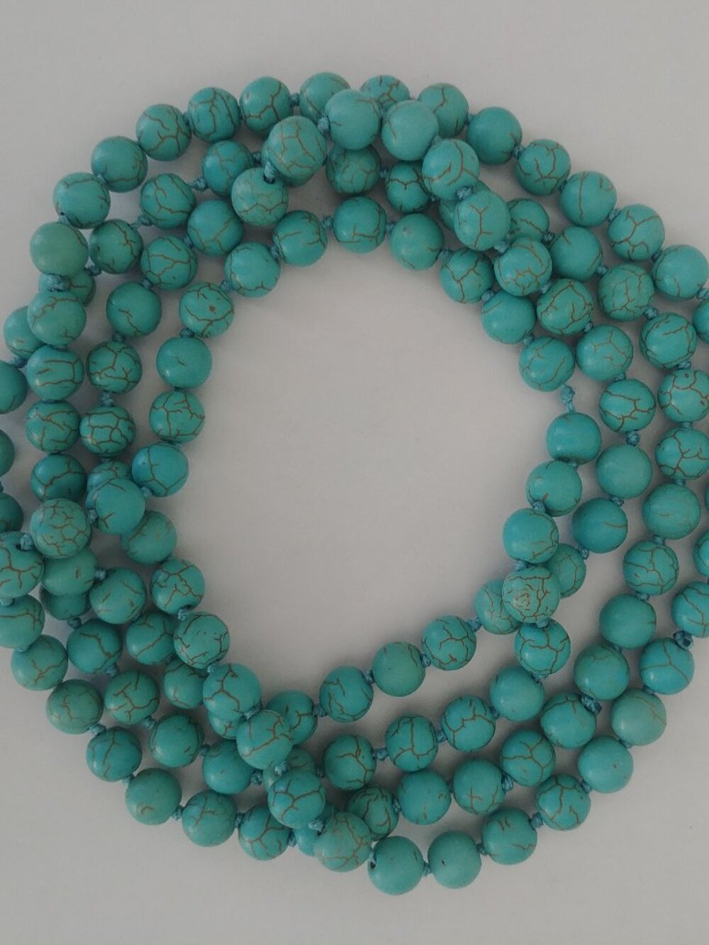 Long heavy speckled turquoise look beaded strand necklace